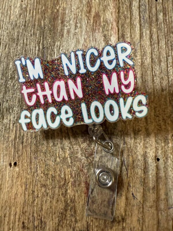 Product Image for  Badge Reel I’m nicer than my face looks (color sparkle)