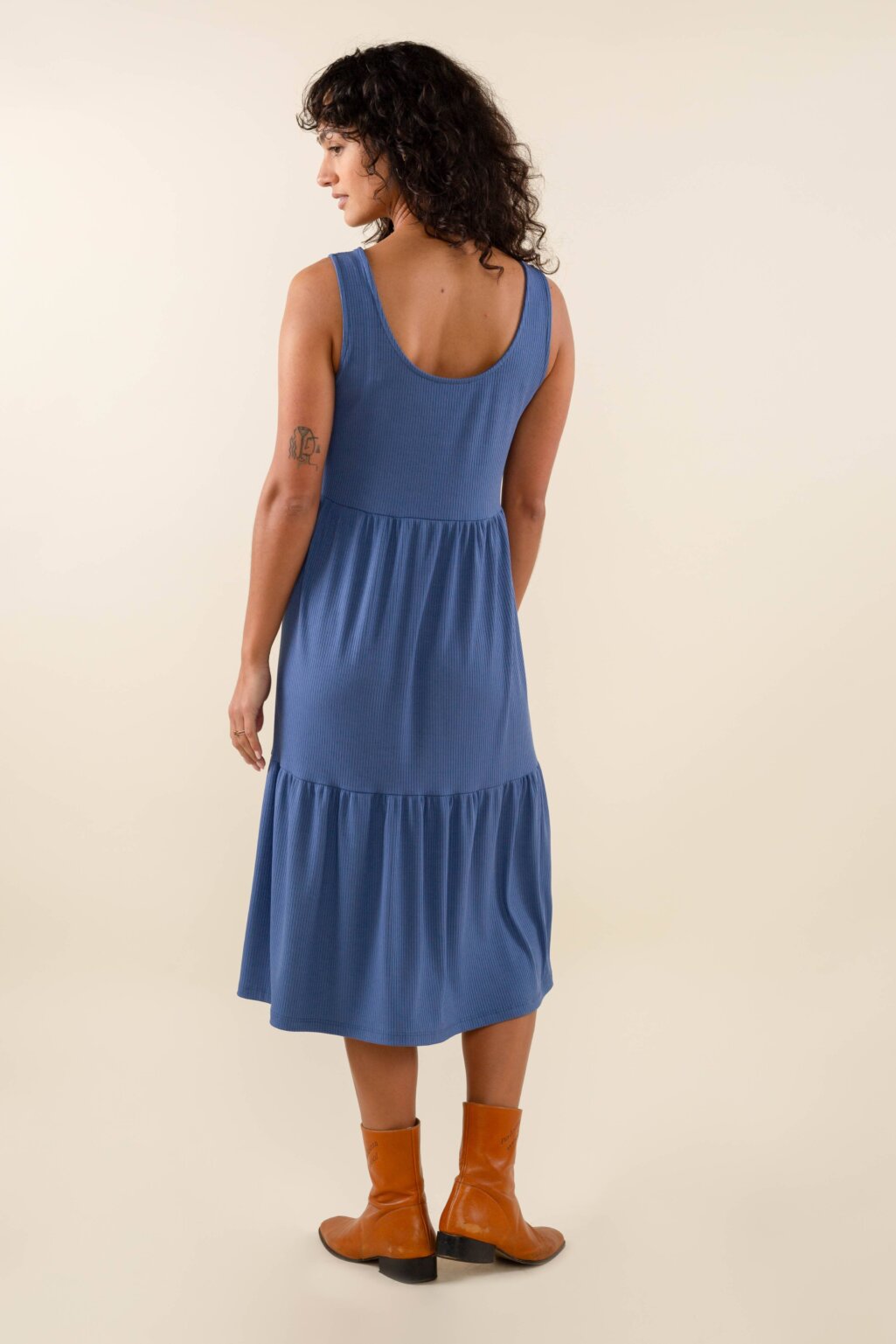 Downloaded from Square for use with Vendor ID (404) and Product ID (Square: 2XDFKOLL2E4QY6GDRMIO6PMD - WC: 72524). Product Image for U-neck Tiered Rib Dress: Denim, S