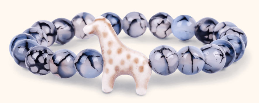 Downloaded from Shopify for use with Vendor ID (979) and Product ID (8340717928742). Product Image for The Trek Bracelet – Track a Giraffe