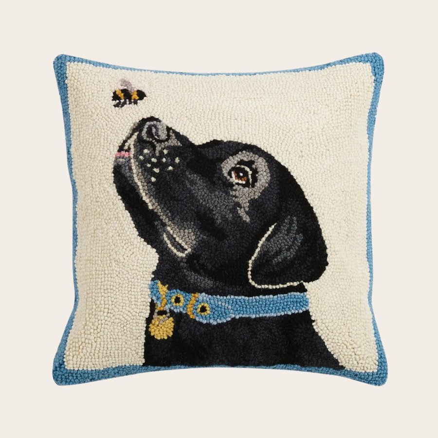 Downloaded from Shopify for use with Vendor ID (1042) and Product ID (10200688099460). Product Image for Black Labrador Dog with Bee Hook Pillow