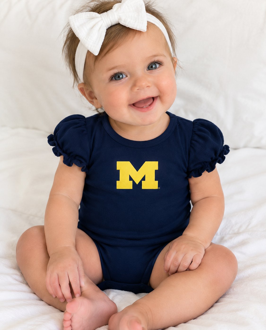 Downloaded from Shopify for use with Vendor ID (370) and Product ID (15524868522208). Product Image for University Of Michigan Puff Sleeve Bodysuit